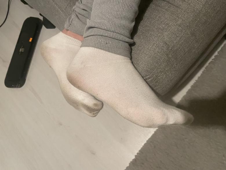 Verschwitzte getragene Socken